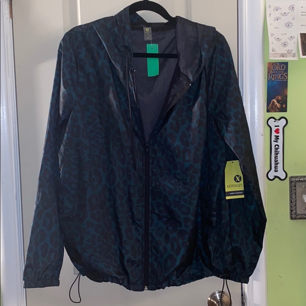 Xersion water resistant cheetah wind breaker